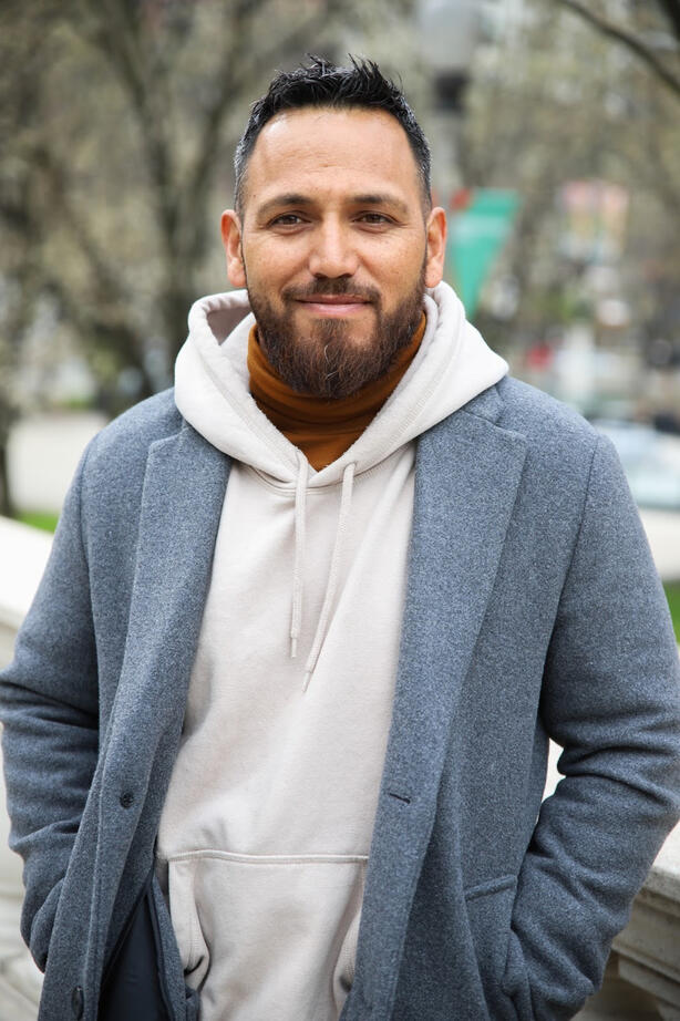 Fabian Lopez poses for a portrait at Millennium Park in Chicago on April 15, 2025. Lopez came to Chicago so he could take classes for his job which is construction.