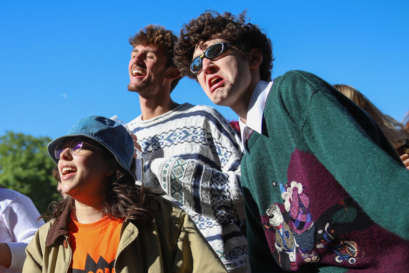 Melina Arevalo, left, and Rocco Meo, right, dance together at Grant Slam Festival at Jonquil Park on Saturday, May 10, 2025. The two were at the front of the crowd during the Growing Boys set and created a lot of energy for the group.