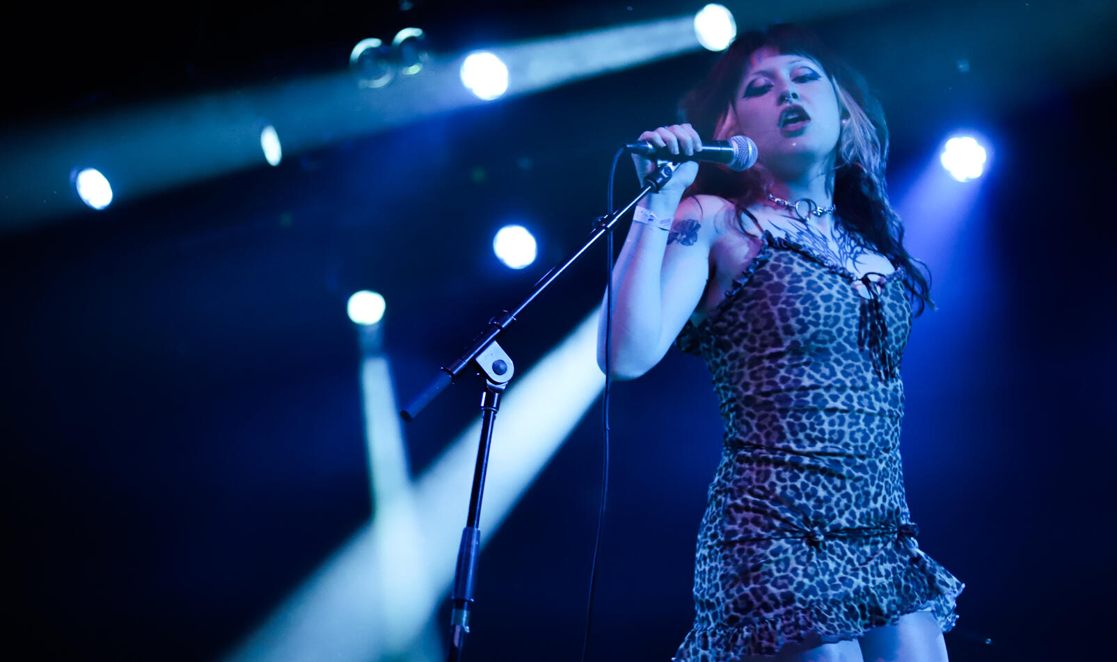 Lillie Della Penna sings center stage at the Bottom Lounge as the lead singer of “Babe Haven” on Tuesday, April 22, 2025. The group performed the song “Nuisance” as a live debut that night.