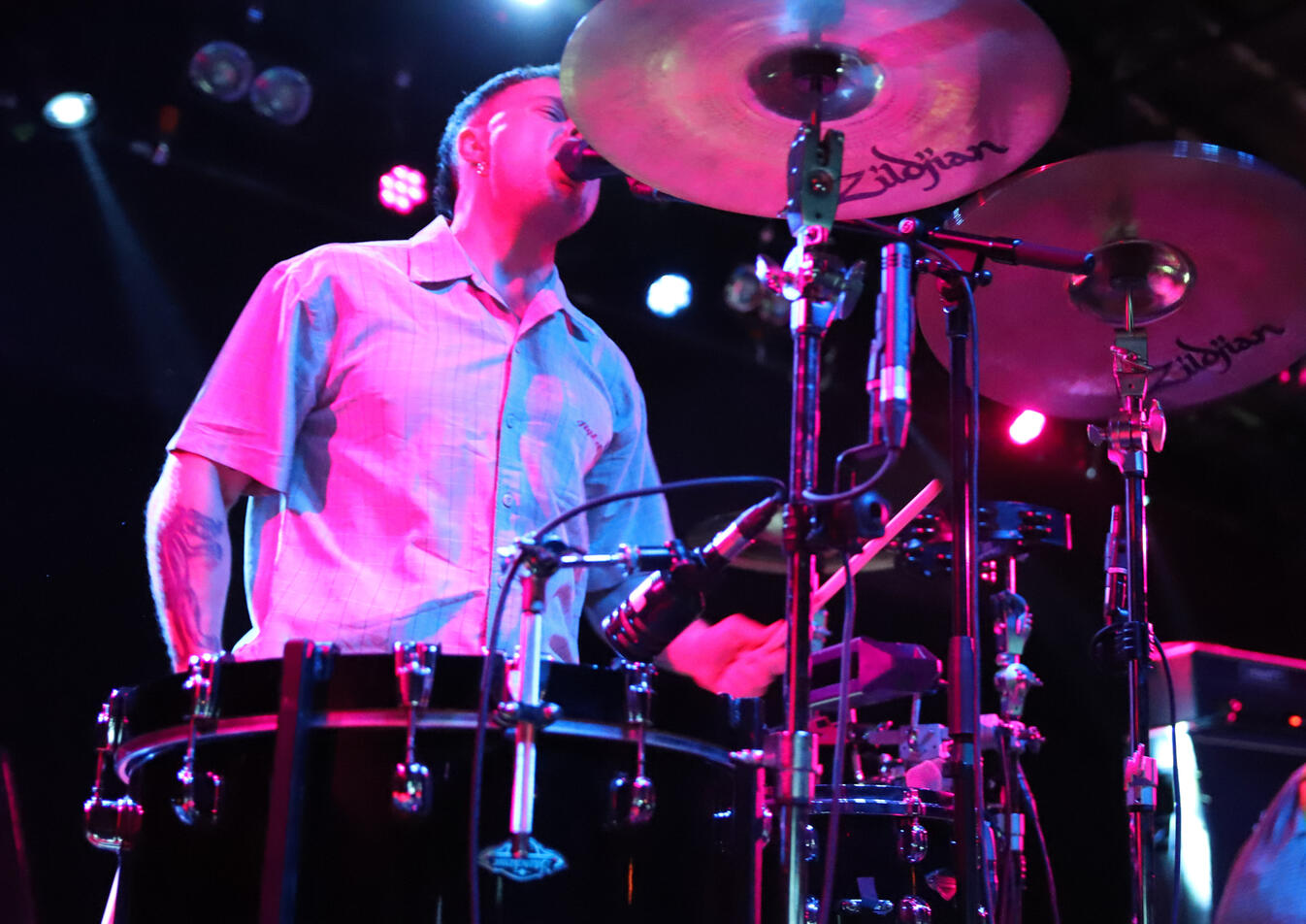 Issac Holman plays the drums as a part of the duo, “Soft Play” at the Bottom Lounge on Thursday, April 22, 2025. Holman and Laurie Vincent are the two members in the U.K. punk band “Soft Play”.