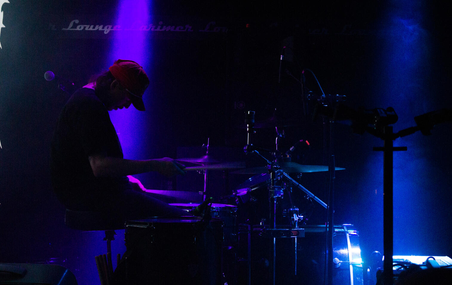 Matthew Witsoe, drummer for “Breakup Shoes,” silences the ride cymbal after finishing a song at Larimer Lounge on April 18, 2023. The group opened up for “Phoneboy” on their first headliner tour.
